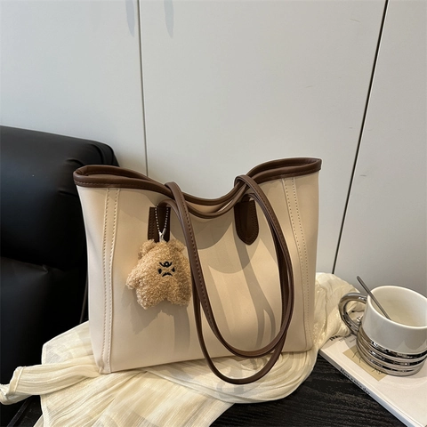 Women Minimalist PU Leather Tote Bag Large Capacity Commute Shoulder Bag With Plush Bear Charm Contrast Color Handbag