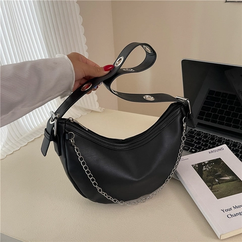 Women Minimalist Crescent Shoulder Bag PU Leather Hobo Bag With Silver Metal Chain And Eyelet Strap Chic Underarm Bag