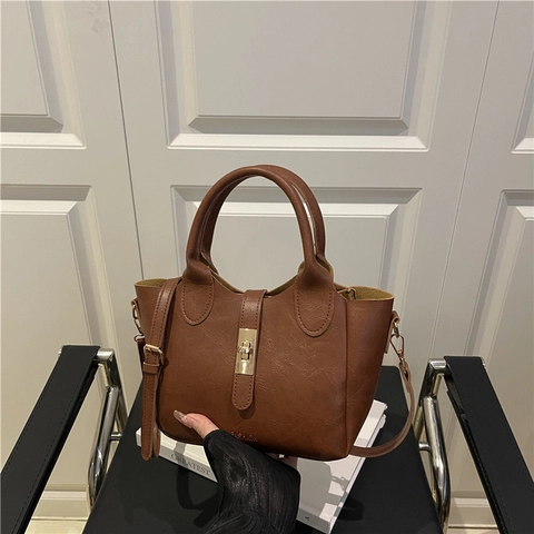 Bolso Cubo de Cuero PU para Mujer Vintage Color Sólido Con Cierre de Metal Bolso Bandolera Bolso Casual