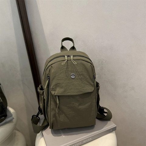Mochila de Nailon Ligera Minimalista Japonesa para Mujer Moda Color Sólido Casual Viaje Mini Bolso Con Bolsillo Frontal de Cremallera