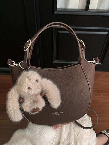 Niche Minimalist Textured PU Leather Crescent Bucket Bag For Women Pebbled Stitching Shoulder Crossbody Bag With Plush Rabbit Pendant