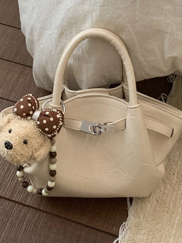 Sac Seau en Cuir PU pour Femmes Minimaliste Vintage Sac à Main Bandoulière Avec Serrure en Métal et Pendentif Ours