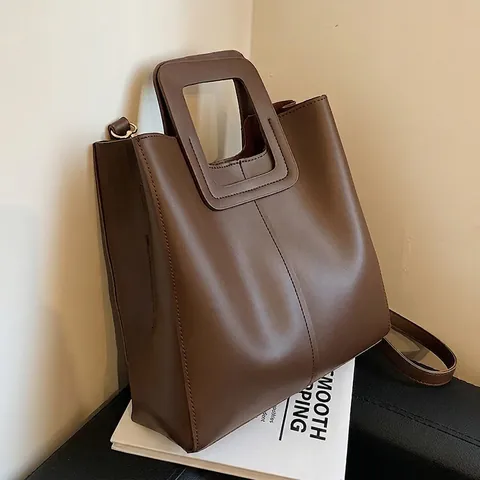 Damen Vintage PU-Leder Tragetasche Große Kapazität Quadratischer Hohler Griff Schulter Crossbody Tasche Retro Eimer Pendler Geldbörse