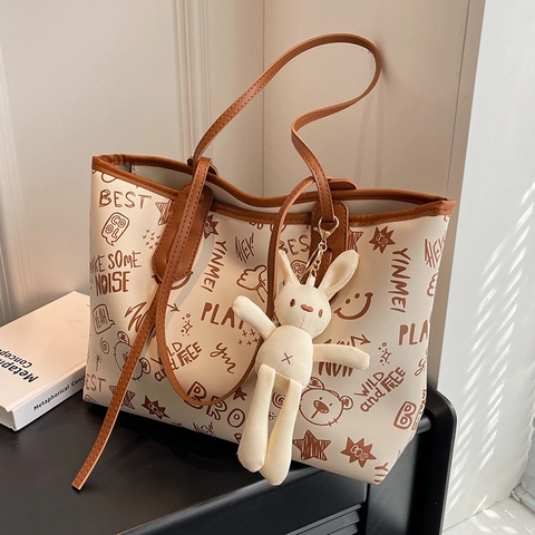 Women Large Capacity Graffiti Tote Bag PU Leather Shoulder Bag With Bunny Pendant Casual Shopping Bag School Commute Handbag