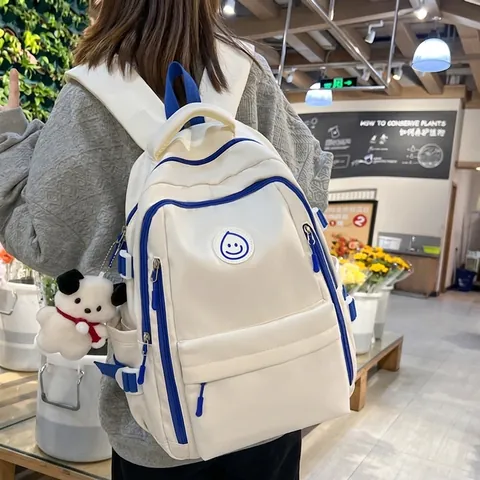 Grote Capaciteit Studenten Schoolrugzak Voor Tieners Multi-Pocket Oxford Doek Rugzak Met Schattige Hanger Glimlach Patroon