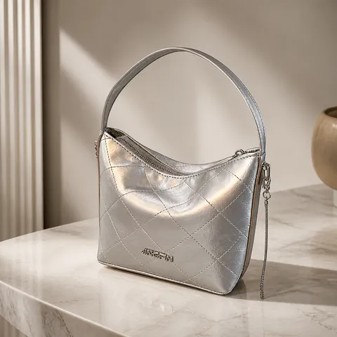 Damen Gesteppte Ketten-Eimertasche PU Leder Umhängetasche Silberne Hardware Nischen-Design Elegante Schultertasche Lässige Reise-Tote