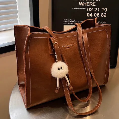 Large Capacity Retro PU Leather Tote Bag For Women With Contrast Stitching And Plush Charm Versatile Simple Shoulder Bag