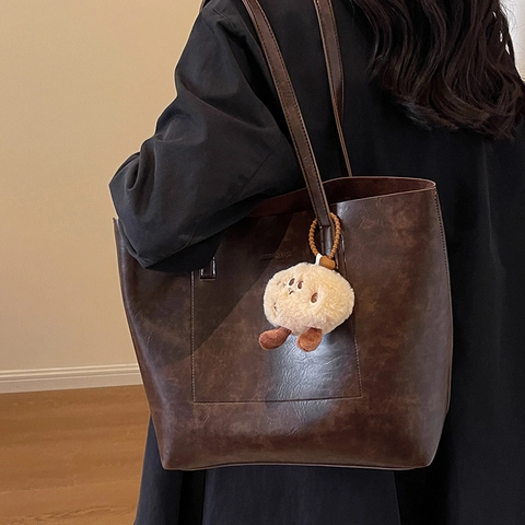 Bolso Tote de Mujer Gran Capacidad Cuero PU Vintage Moda Conmutar Bolso de Hombro Con Colgante de Felpa Otoño Invierno Bolso Shopper Retro Color Sólido