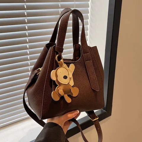 Secchiello da Donna in Pelle PU Trama Litchi Borsa a Mano Retro Con Ciondolo Scimmia Tracolla Regolabile Borsa a Spalla