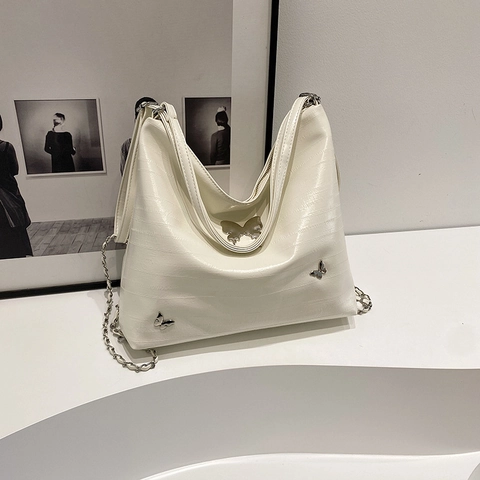 Metallische Schmetterling Deko PU Leder Schultertasche Für Damen Große Kapazität Nische Design Pendler Mehrzweck Rucksack Tragetasche