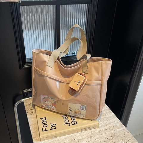 Women Large Capacity Nylon Tote Bag With Transparent PVC Pocket And Biscuit Plush Charm Japanese Style Ita Bag For Commute