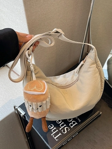 Women Minimalist Nylon Dumpling Crossbody Bag Lightweight Solid Color Moon Shaped Shoulder Bag With Plush Coffee Cup Charm Casual Commuter Bag