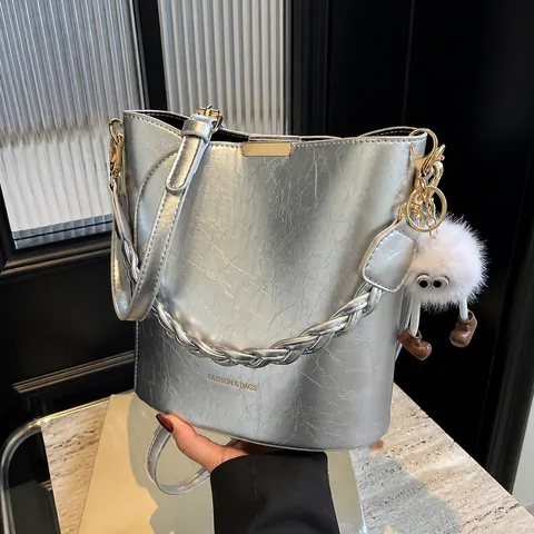 Women Fashion PU Leather Bucket Bag Woven Handle Shoulder Crossbody Bag With Plush Monster Charm Small Designer Handbag