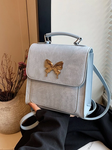Mini Sac à Dos de Mode en Cuir PU pour Femmes Avec Boucle Papillon en Métal Sac à Main Élégant Sac Bandoulière Simple Voyage