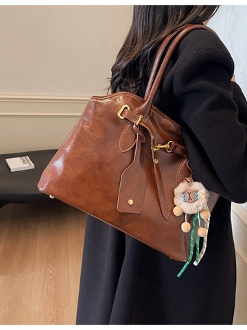 Damen Vintage PU Leder Tragetasche Große Kapazität Umhängetasche Lässige Handtasche Mit Plüsch Anhänger Einfarbig Mode Tasche