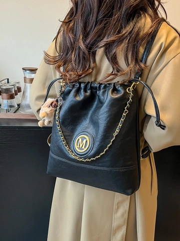 Women's Vintage PU Leather Drawstring Bucket Backpack Fashion Large Capacity Chain Commuter Shoulder Bag With Plush Charm