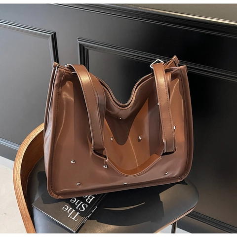 Koreanischer Stil Glänzend PU Leder Große Kapazität Einkaufstasche Herz Nieten Umhängetasche Damen Casual Fashion Handtasche