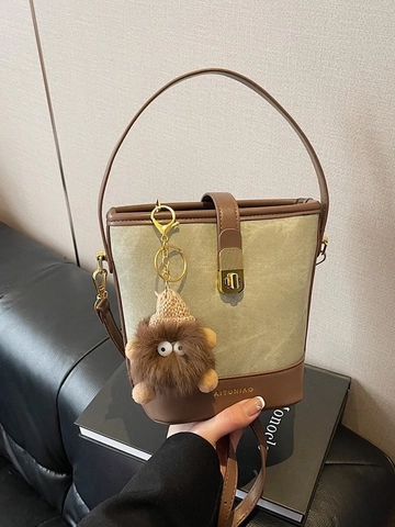 Women Vintage Canvas PU Leather Bucket Bag Contrast Color Shoulder Crossbody Bag With Metal Lock And Monster Pendant