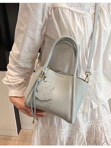 Women's Fashion Litchi Grain PU Leather Bucket Bag Small Crossbody Handbag With Cute Animal Pendant Letter Print Gold Hardware