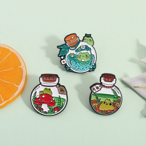 Broche de Esmalte de Rana en Botella a la Deriva Creativa Insignia Pintada de Animales de Dibujos Animados para Ropa Mochila