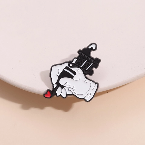 Artistic Tattoo Machine Enamel Brooch Pin Creative Hand Holding Machine With Red Heart Badge Fun Jewelry Gift For Men Women Clothing Decor