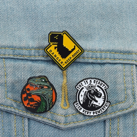Cartoon Dinosaur Enamel Brooch Alloy Painted Animal Badge Danger Sign T-Rex Head Crown Dinosaur Pins For Clothes Bag Accessories Jewelry Gift