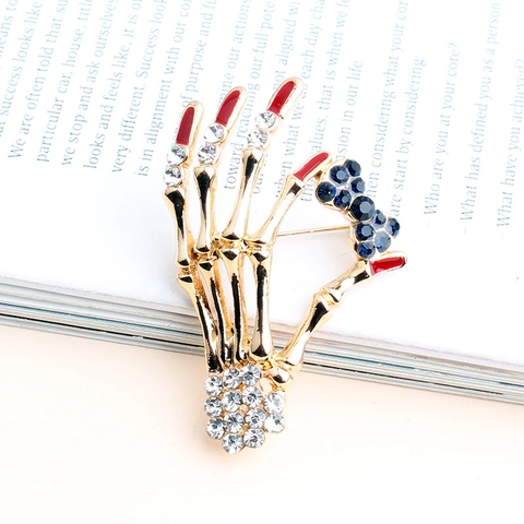 Gothic Skeleton Hand Brooch With Red Enamel Fingernails And Blue Rhinestone Bowknot Alloy Punk Halloween Jewelry For Unisex