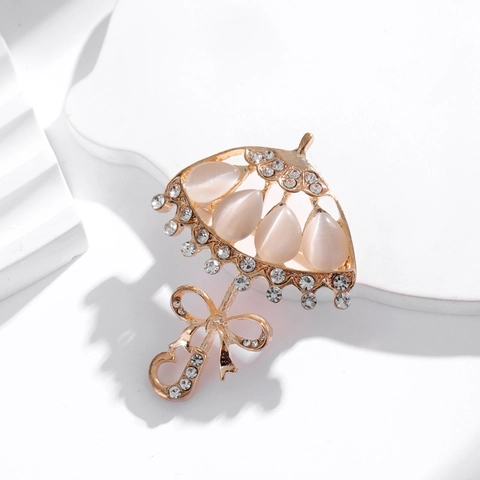 Elegant Umbrella Shape Brooch Gold Plated Alloy Pink Cat's Eye Stone Rhinestone Inlaid Bowknot Brooch For Women Jewelry