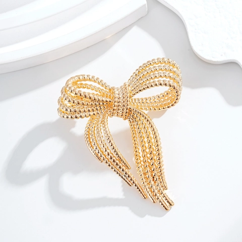 Mode Minimalistisch Legierung Schleife Brosche Für Damen Elegant Hohl Seilknoten Korsett Pin Exquisite Gold Silber Schmuck