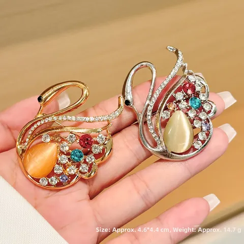Vintage Alloy Rhinestone Swan Brooch For Women Elegant Hollow Cat Eye Stone Pins Anti-Exposure Corsage Coat Jewelry Gift