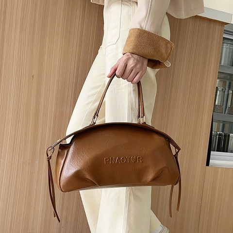 Vrouwen Vintage PU Leren Schoudertas Grote Capaciteit Boston Stijl Minimalistische Dagelijkse Handtas Met Kwastjes Logo-reliëf