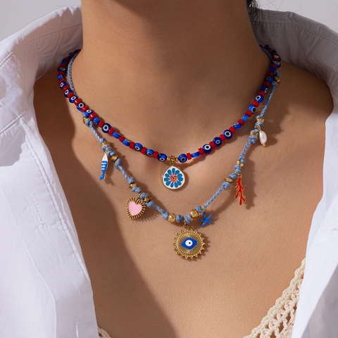 Collana Bohemienne in Acciaio Inossidabile con Malocchio per Donna Perla Artificiale Cuore Pesce Girasole Ciondolo Gioielli Funky Regalo