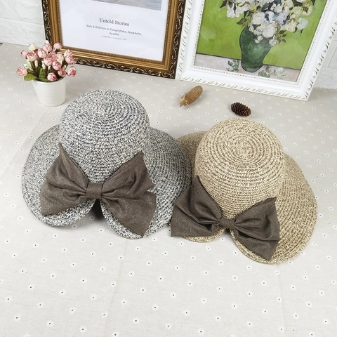 Cappello a Secchiello in Paglia di Carta Elegante da Donna Con Grande Fiocco a Farfalla Tesa Larga Protezione Solare Estiva da Spiaggia Traspirante Pieghevole