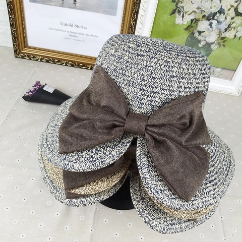Cappello a Secchiello in Paglia di Carta Elegante da Donna Con Grande Fiocco a Farfalla Tesa Larga Protezione Solare Estiva da Spiaggia Traspirante Pieghevole