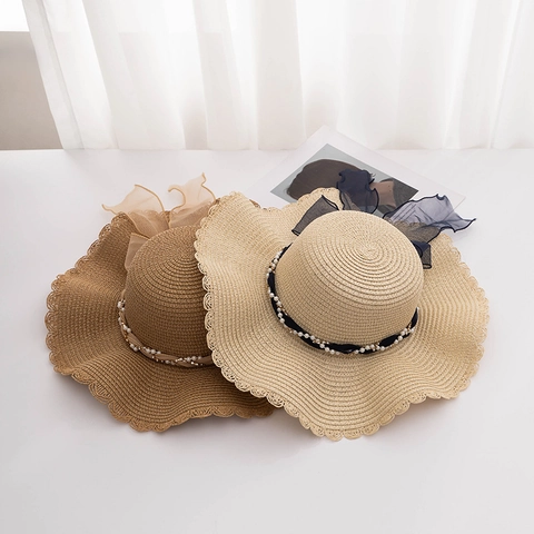 Women Large Wavy Brim Straw Hat Artificial Pearl Bow Ribbon Sun Hat Breathable Paper Straw Beach Vacation Sunshade Hat
