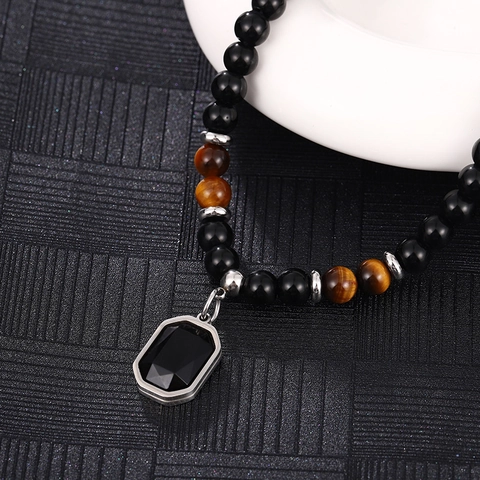 Collier Perlé Vintage en Œil de Tigre et Pierre Œil de Chat Unisexe Acier Inoxydable Pendentif Géométrique Strass Noir Bijoux