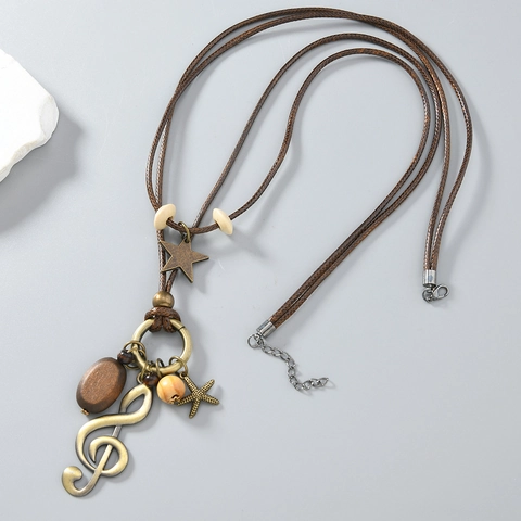 Collana Doppio Strato Vintage Bohemien Ciondolo Stella Chiave di Violino in Lega Fatto a Mano Perlina in Legno Lunga Catena Maglione Cordino Cerato