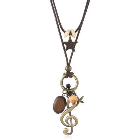 Collana Doppio Strato Vintage Bohemien Ciondolo Stella Chiave di Violino in Lega Fatto a Mano Perlina in Legno Lunga Catena Maglione Cordino Cerato