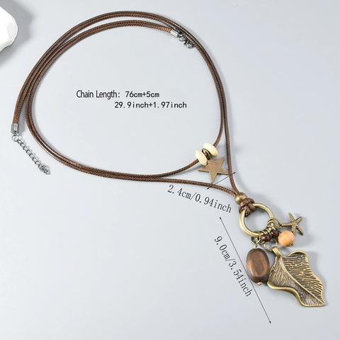 Sautoir Long Vintage Bohème Pendentif Feuille Étoile de Mer en Alliage de Bronze Perles en Bois Bijoux Ethniques pour Femmes