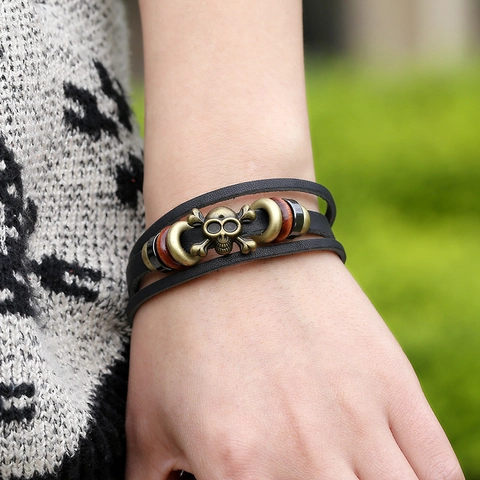 Bracciale in Pelle Intrecciata Multistrato Vintage Punk Ciondolo in Lega di Metallo a Forma di Teschio Cinturino Retro Tessuto a Mano Per Uomo Donna Gioielli