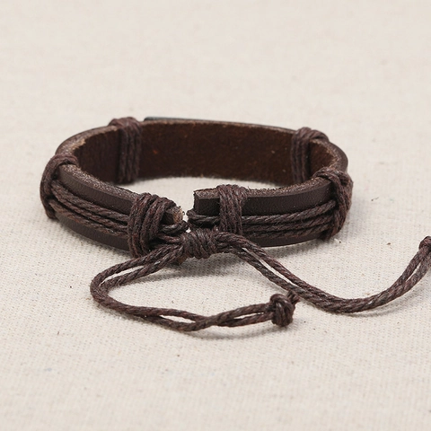 Bracciale in Pelle di Vacchetta Intrecciata Retro per Uomo Donna Piastra in Lega Argento Antico Lettera Forgiven Stile Punk Polsino Regolabile Gioielli