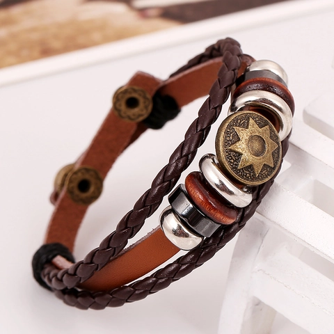 Braccialetto in Vera Pelle di Vacchetta Multistrato Retro Punk Fatto a Mano per Uomo Donna Intrecciato Lega Motivo Sole Perle Legno