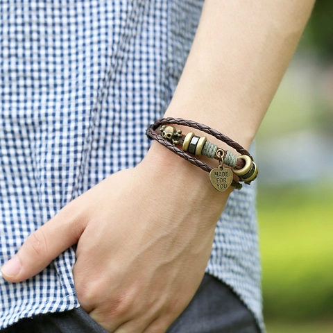 Bracciale in Pelle Intrecciata Multistrato Vintage per Uomo Donna Punk Lega Teschio Cuore Ciondolo Gioielli Regolabili Cinturino a Mano