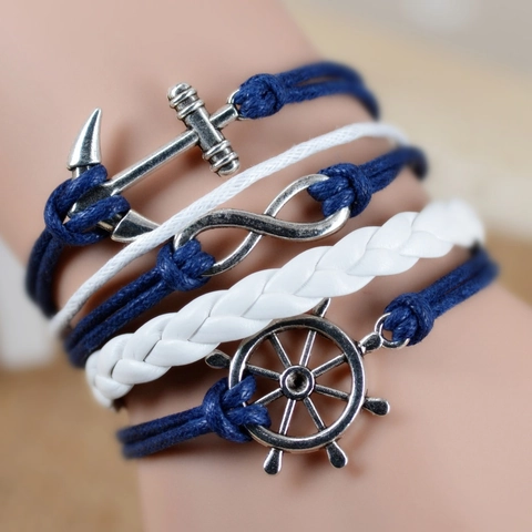 Bracciale Intrecciato Multistrato Nautico Vintage per Donna Uomo Ciondolo Ancora Timone Infinito in Lega Blu Bianco Corda di Cera Pelle PU
