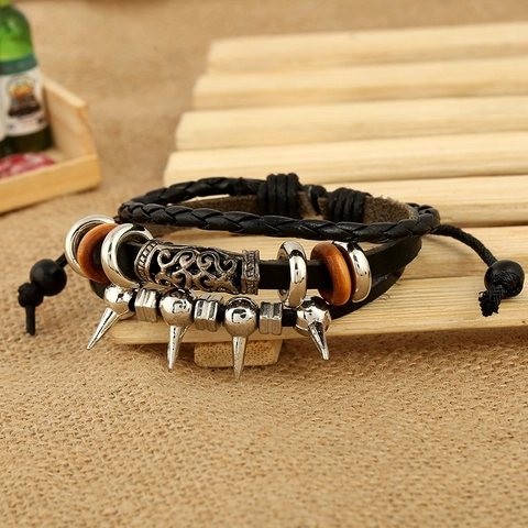 Bracciale Punk in Vera Pelle Multistrato Retrò in Pelle di Vacchetta Intrecciata Punte di Metallo Perle di Legno per Uomo Donna