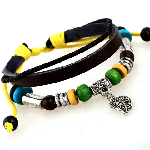 Bracciale in Pelle di Vacchetta Boemia Vintage Fatto a Mano Ciondolo Foglia Lega Perline Legno Multistrato Gioielli Punk Regolabili