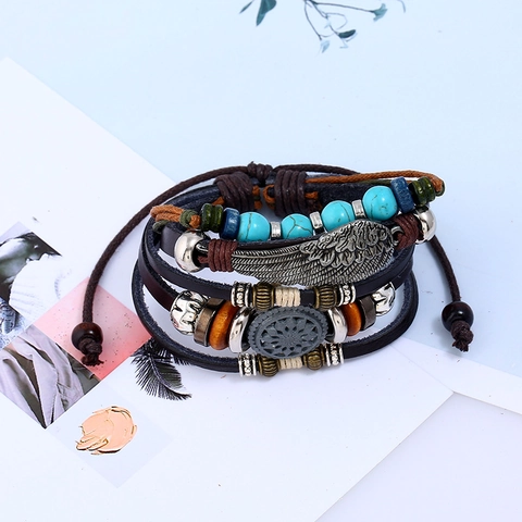 Bracciale Vintage Bohemian Multistrato in Vera Pelle per Uomo Donna Intrecciato Regolabile Lega Piuma Ala Punk Gioielli
