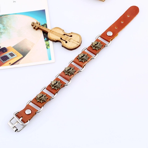 Bracciale Teschio in Pelle Punk Vintage Cinturino in Vacchetta Regolabile con Anelli di Metallo Gioielli Retro Unisex