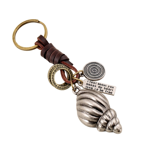 Llavero de Cuero de Vaca Vintage Concha Punk Trenzado Aleación Etiqueta Grabada Adorno de Bolso Retro Llavero Unisex Regalo