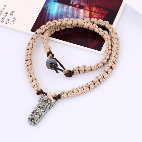 Retro Handgeweven Runderleer Halsketting Voor Heren Dames Vintage Legering Reliëf Hanger Strand Stijl Punk Etnisch Sieraden